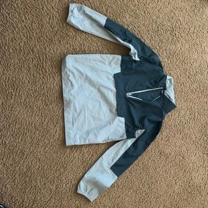 Navy and gray under armor wind breaker